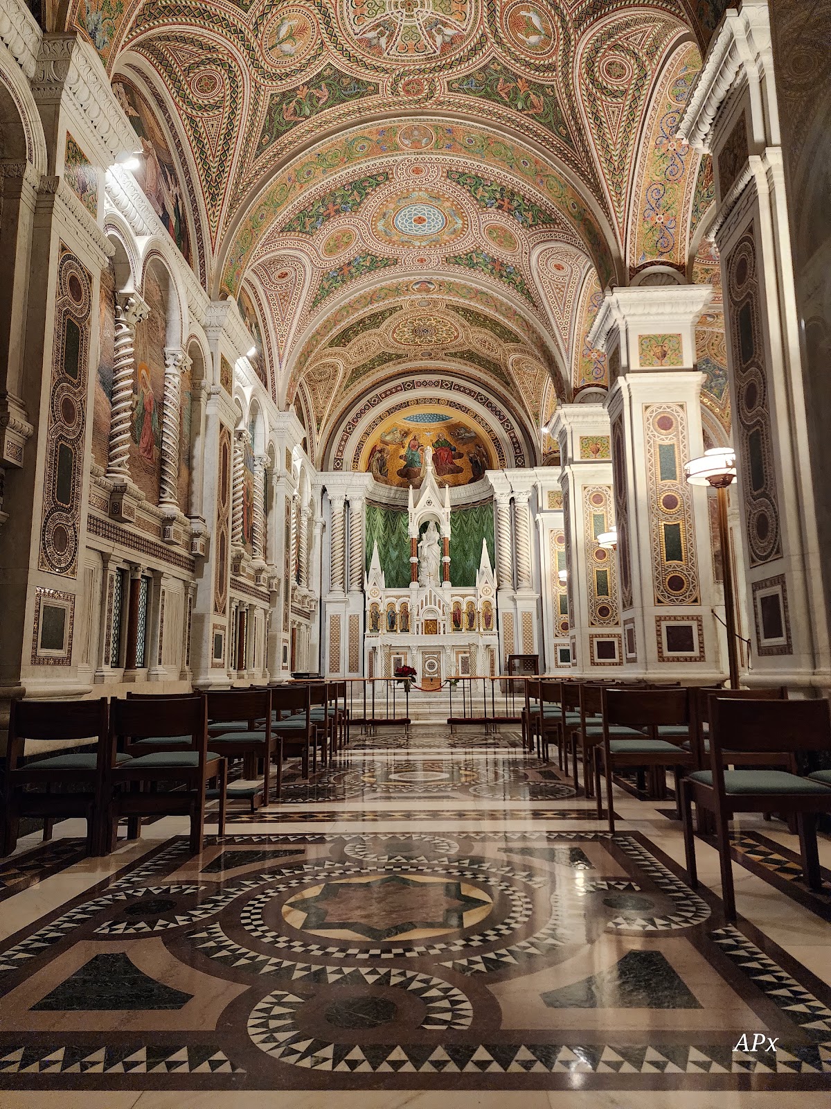 Specular glints catching across gold mosaic at the Cathedral Basilica of Saint Louis