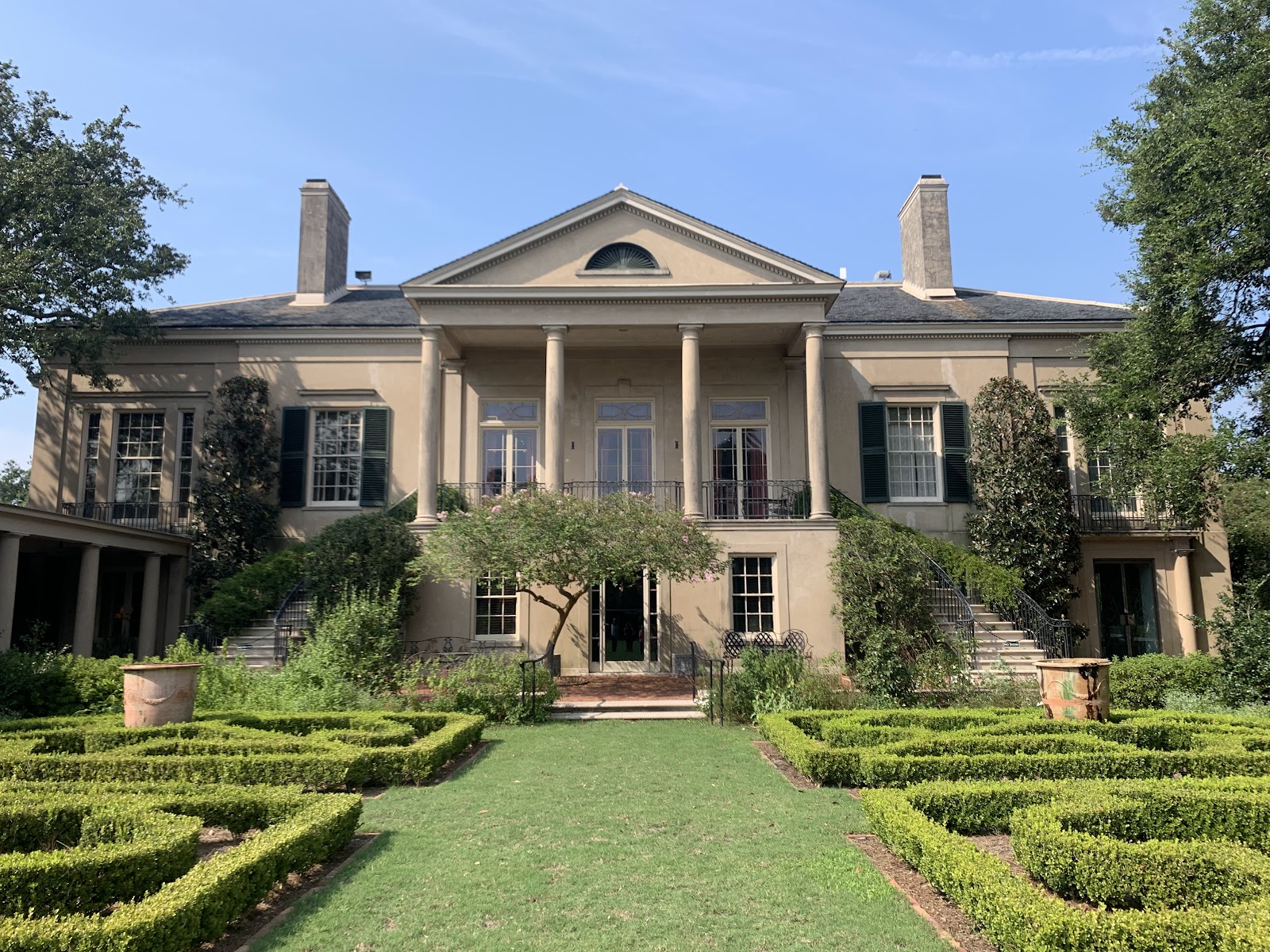 Symmetrical axial view along a formal garden axis at Longue Vue, New Orleans