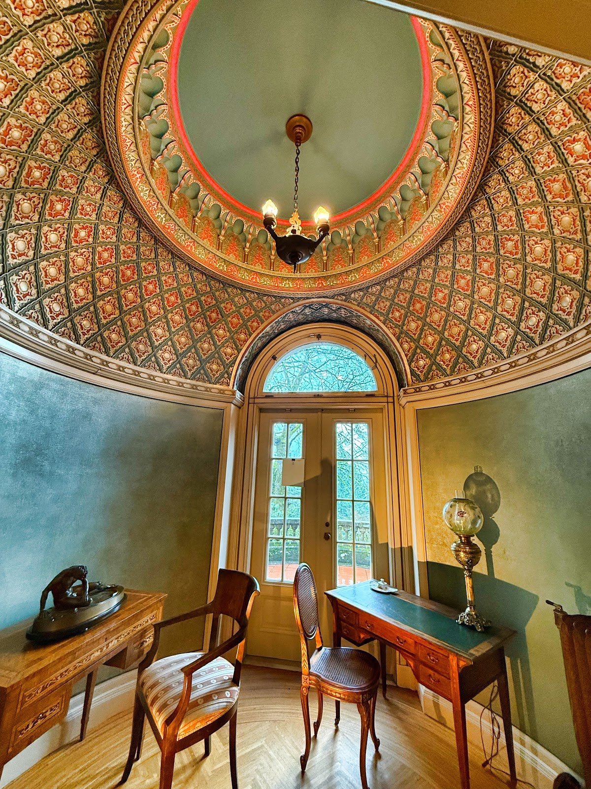 Grand staircase and plaster detail inside Pittock Mansion, Portland Oregon