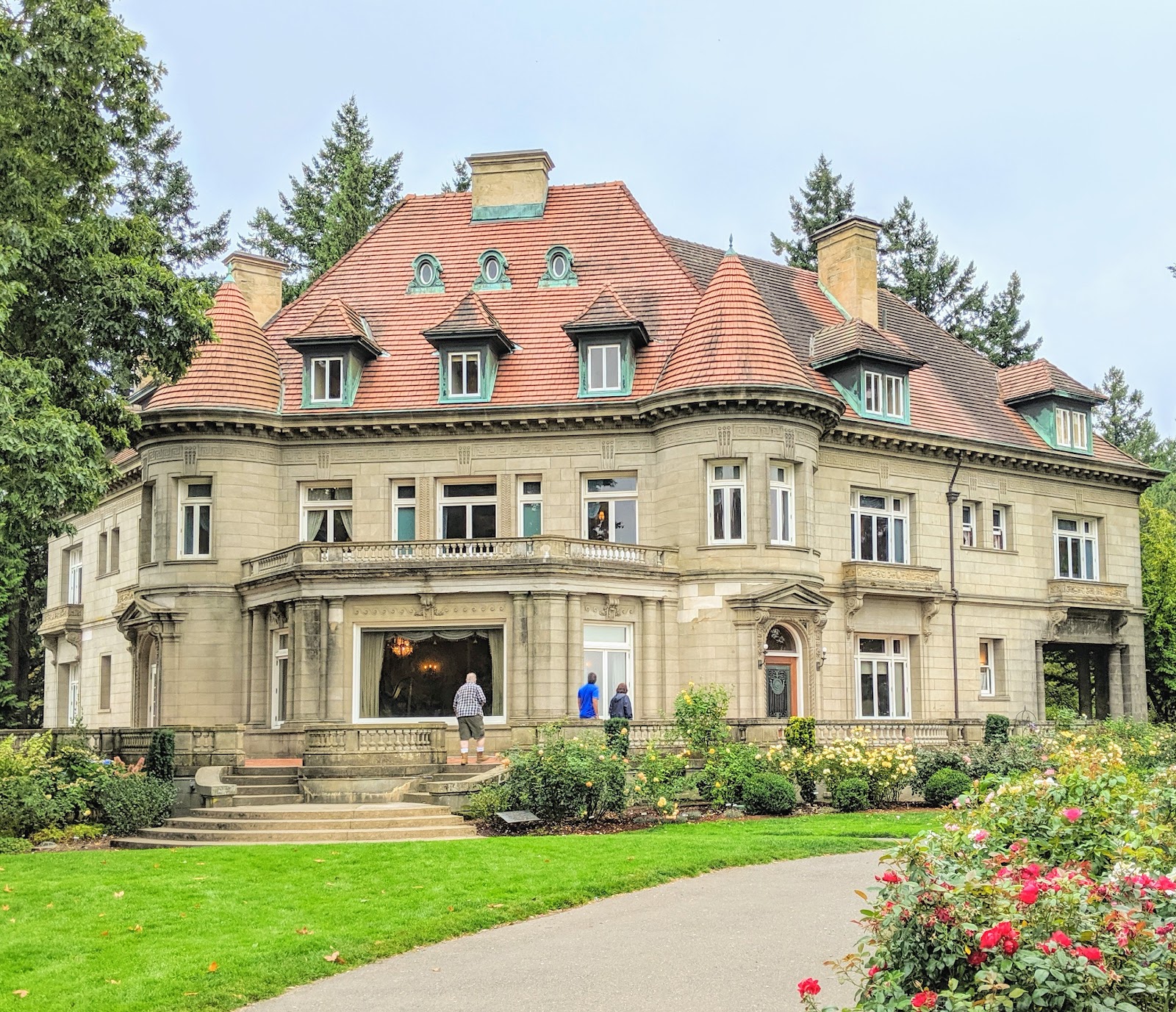 West-facing terrace at Pittock Mansion overlooking Portland at sunset, used for wedding portraits