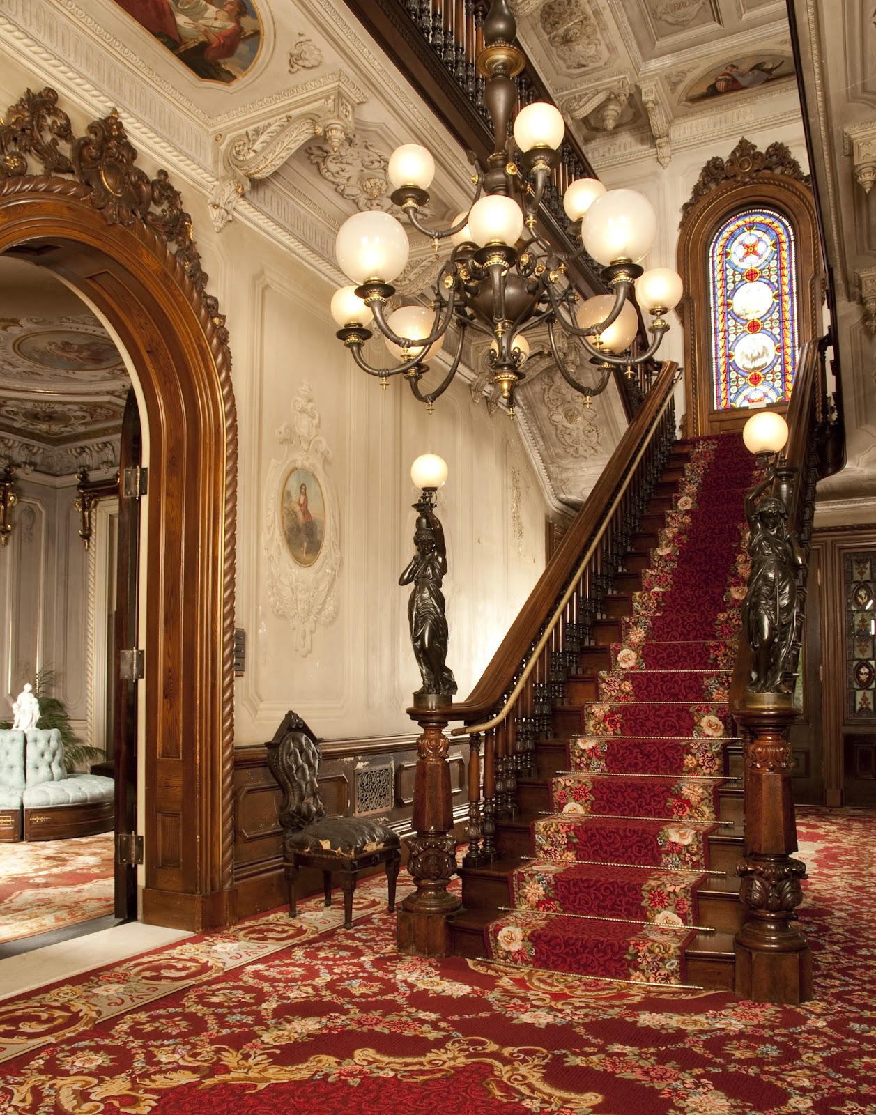Deep-coloured painted Victorian interior with original decoration at Victoria Mansion, Portland Maine