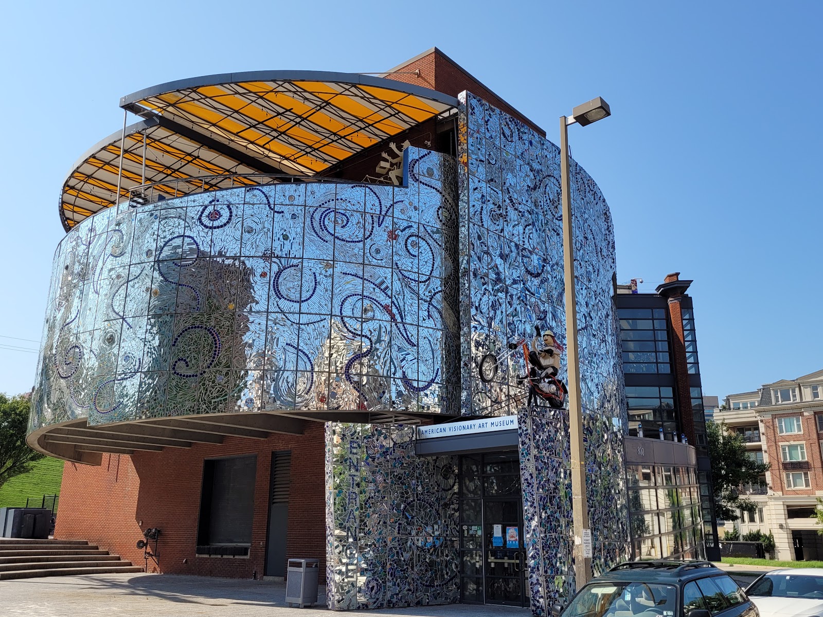 Mirror and glass mosaic wall at the American Visionary Art Museum scattering light in all directions