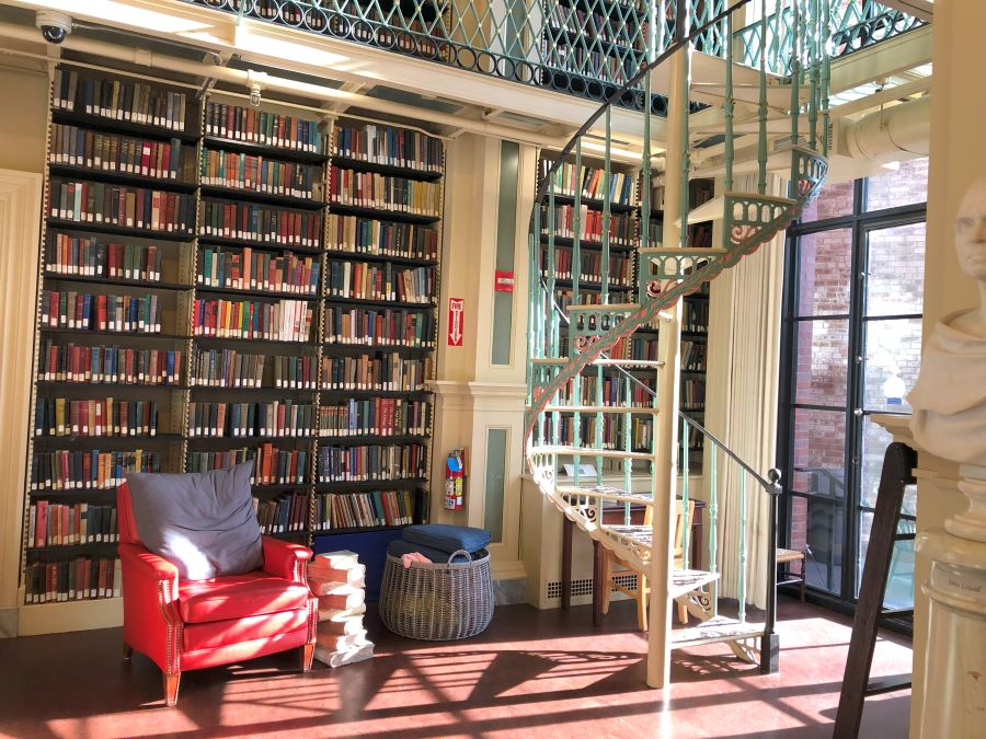 View down into a reading room from a gallery level at the Boston Athenaeum, Boston