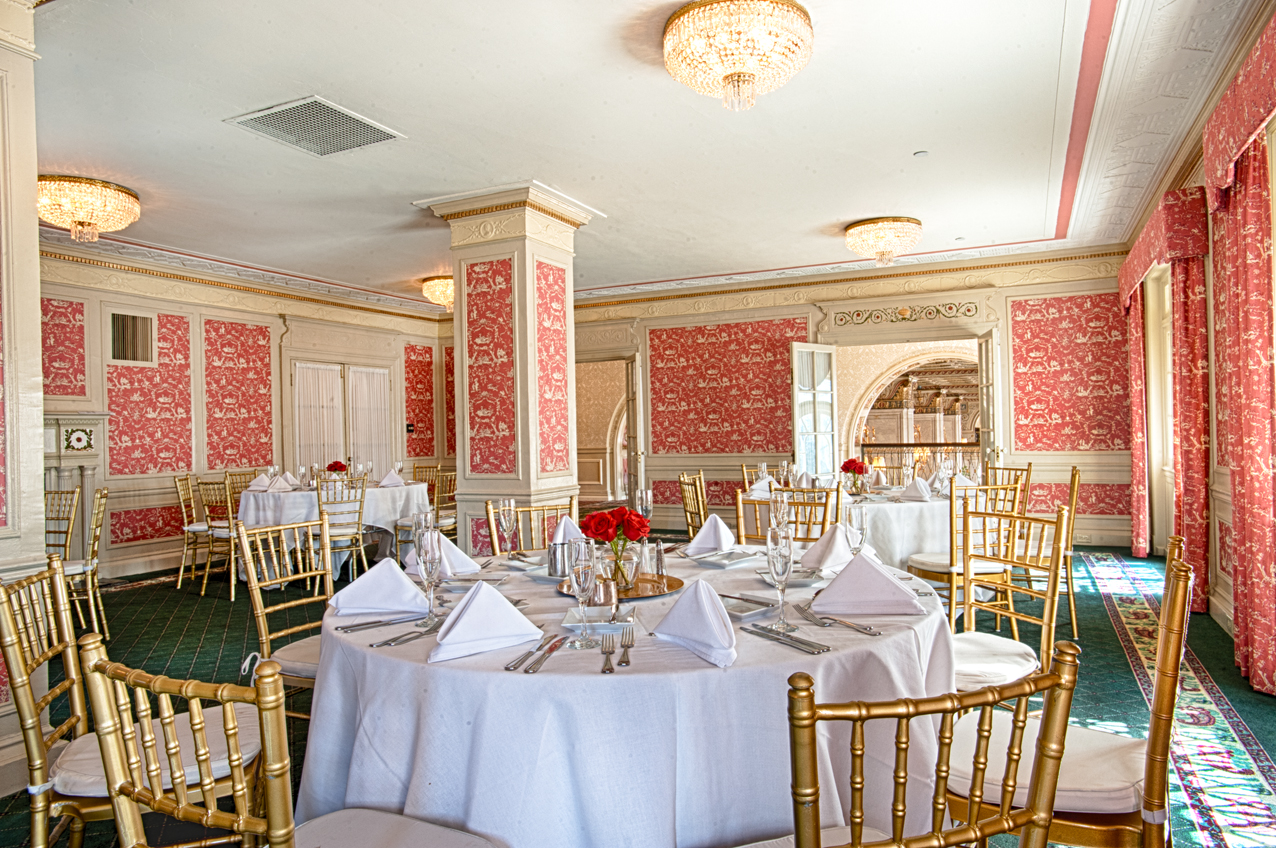 Upper ballroom at the Brown Hotel lit for an evening wedding reception