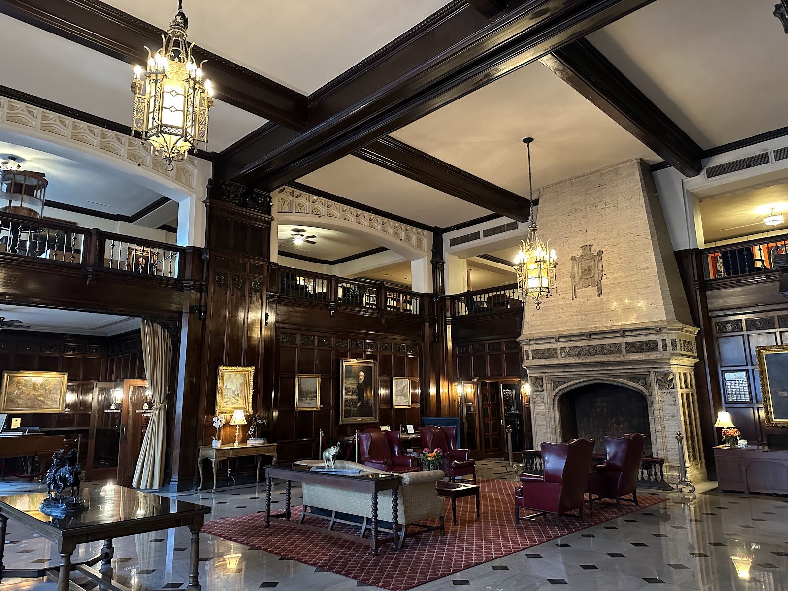 Dark wood panelled club interior with heavy joinery and deep colour