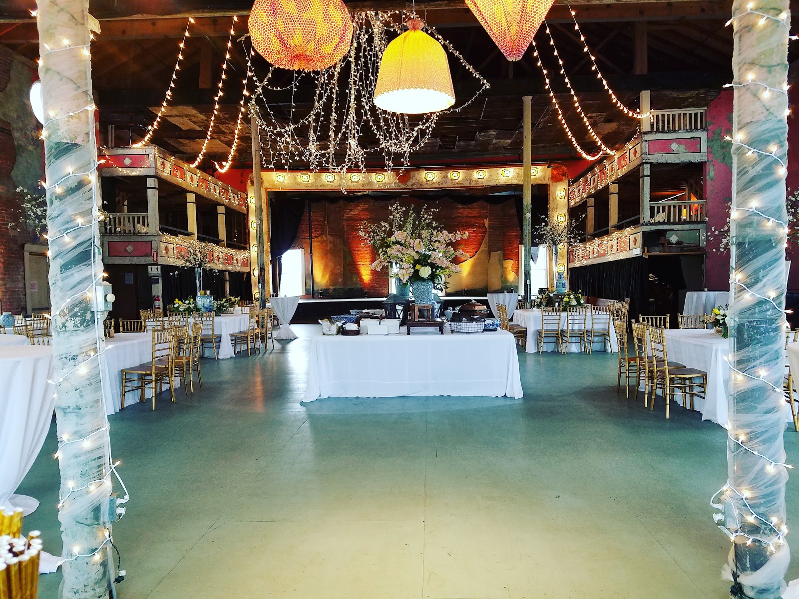 Wide view of the Crystal Ballroom ceiling and scale before a wedding reception fills the floor