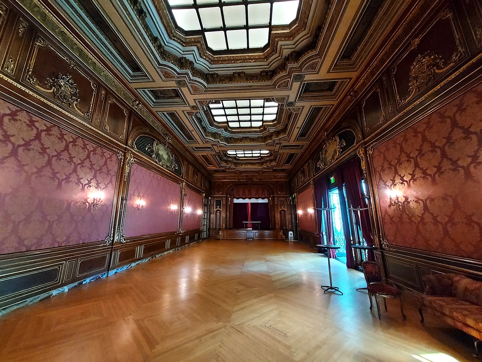 Elaborate staircase with landing window at the Garrett-Jacobs Mansion, used for wedding portraits