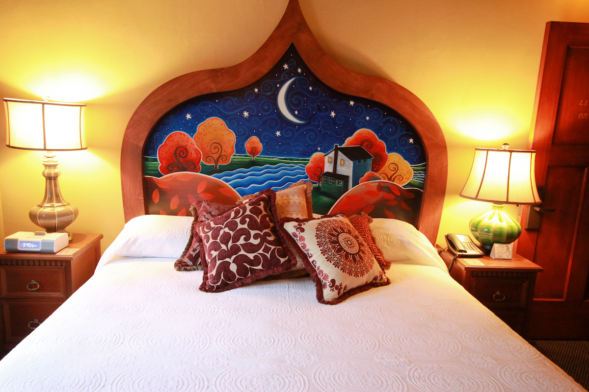 Warm mixed artificial lighting in an interior room at McMenamins Kennedy School, Portland