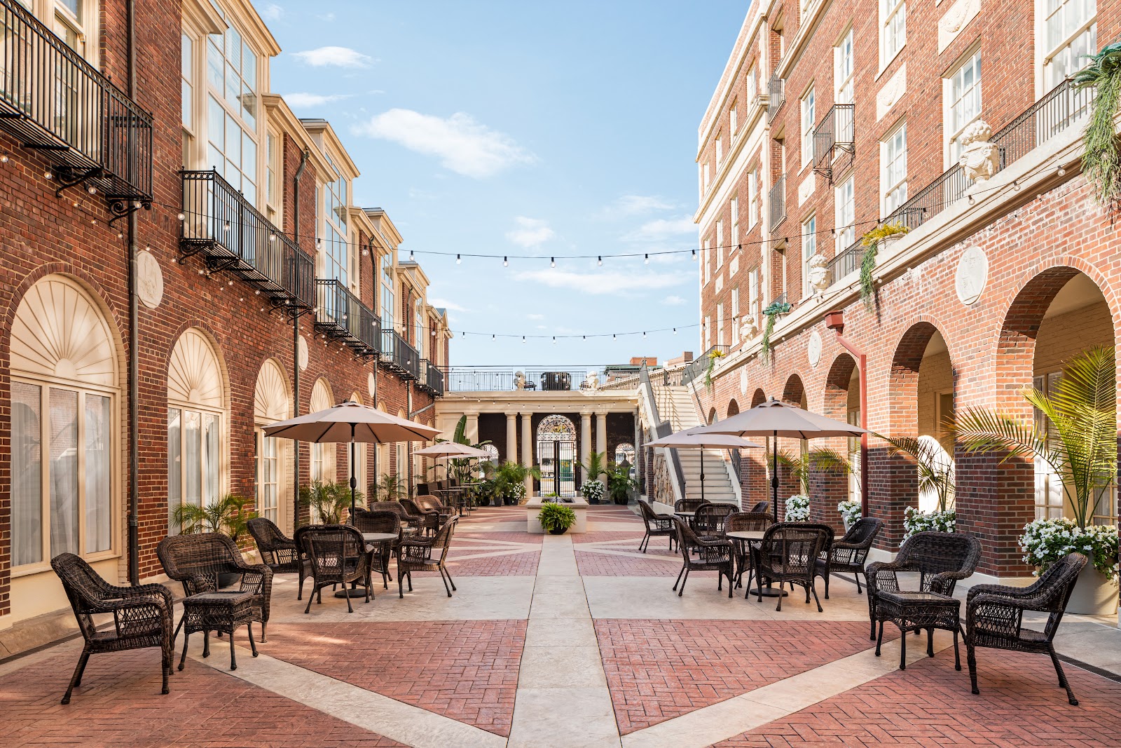 Enclosed interior courtyard in soft open shade at the Magnolia Hotel, Omaha