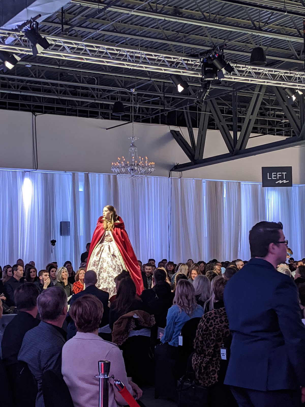 Festoon lighting installed under a timber ceiling at an industrial wedding reception in Omaha
