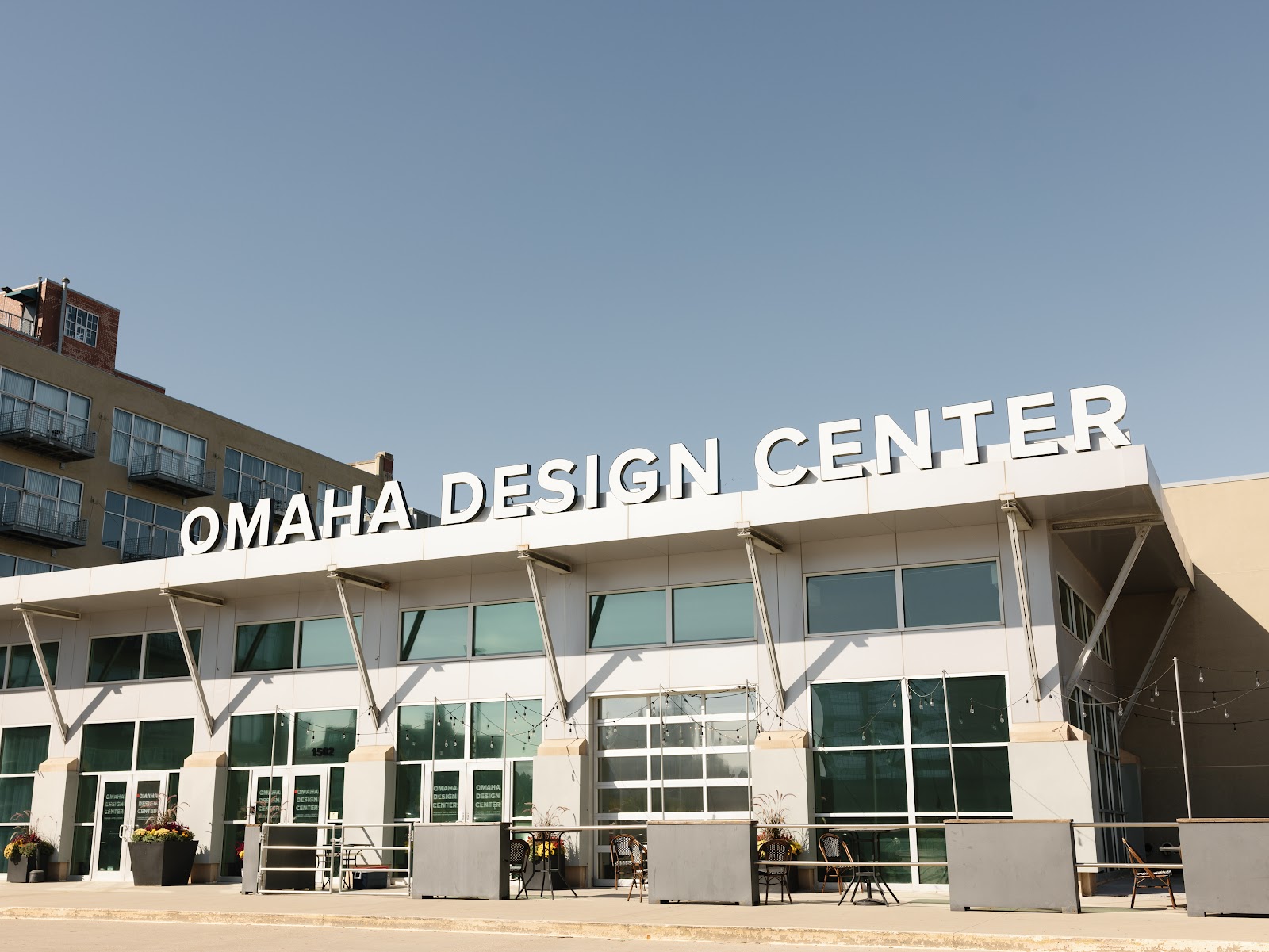 Wedding portrait lit by a large industrial window used as a side light at the Omaha Design Center