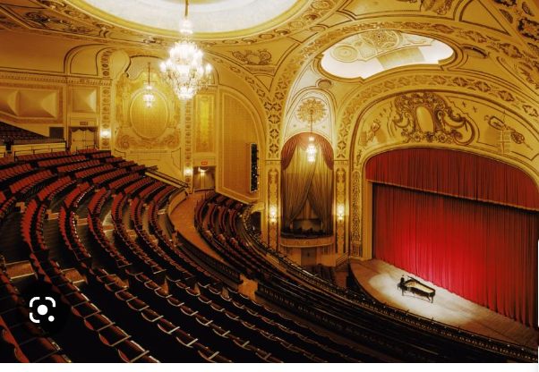 Lit proscenium stage against a dark auditorium at the Orpheum Theater, Omaha