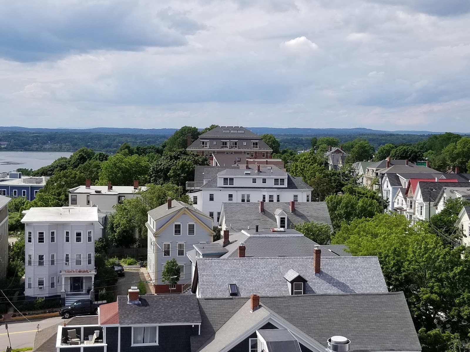 Period window opening at the top of the Portland Observatory with Casco Bay beyond