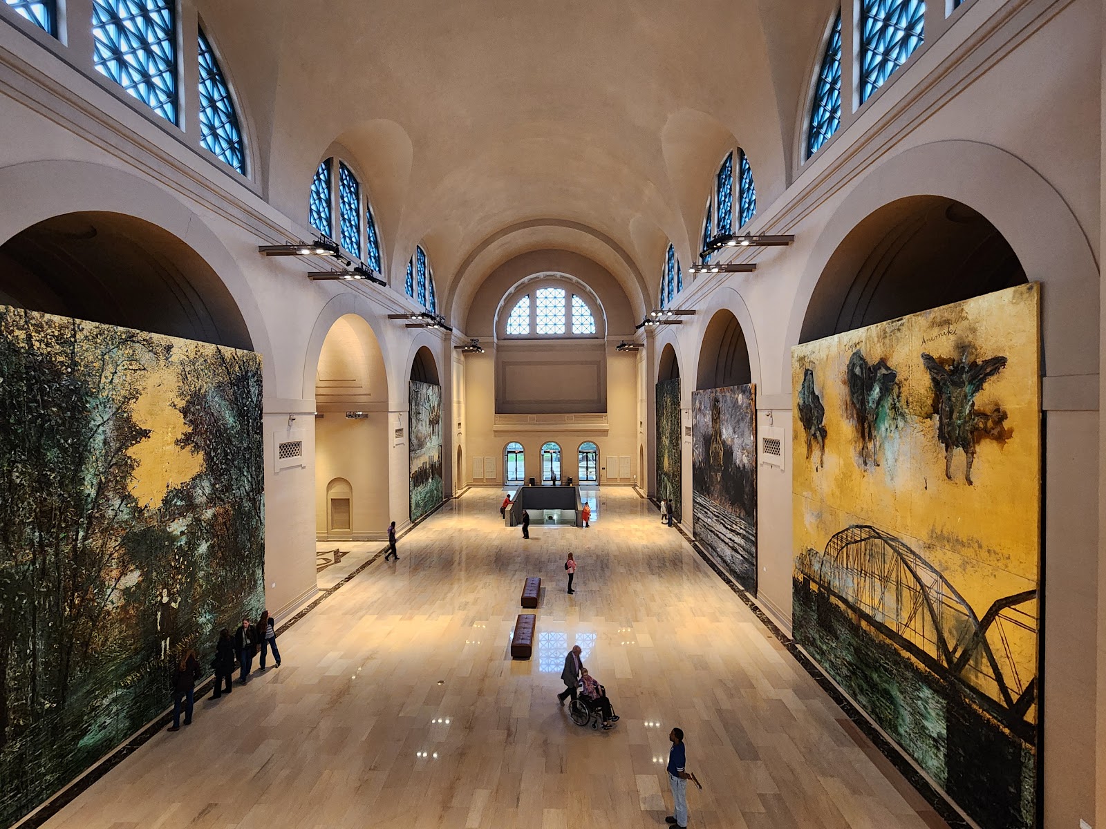 Tightly pooled warm gallery lighting at the Saint Louis Art Museum