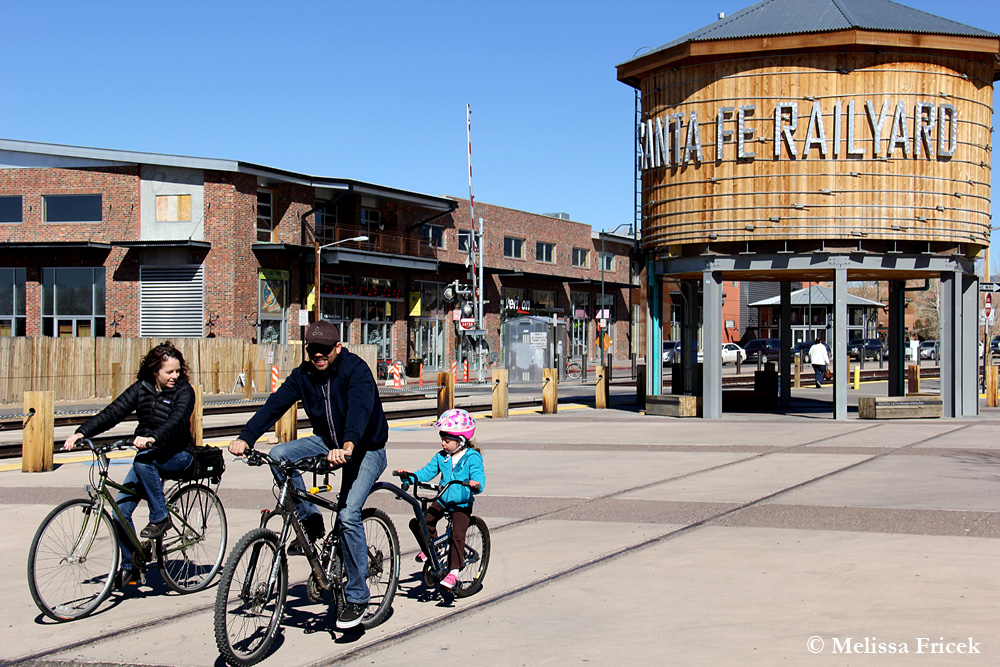 Low sun raking along ribbed corrugated metal in the Santa Fe Railyard