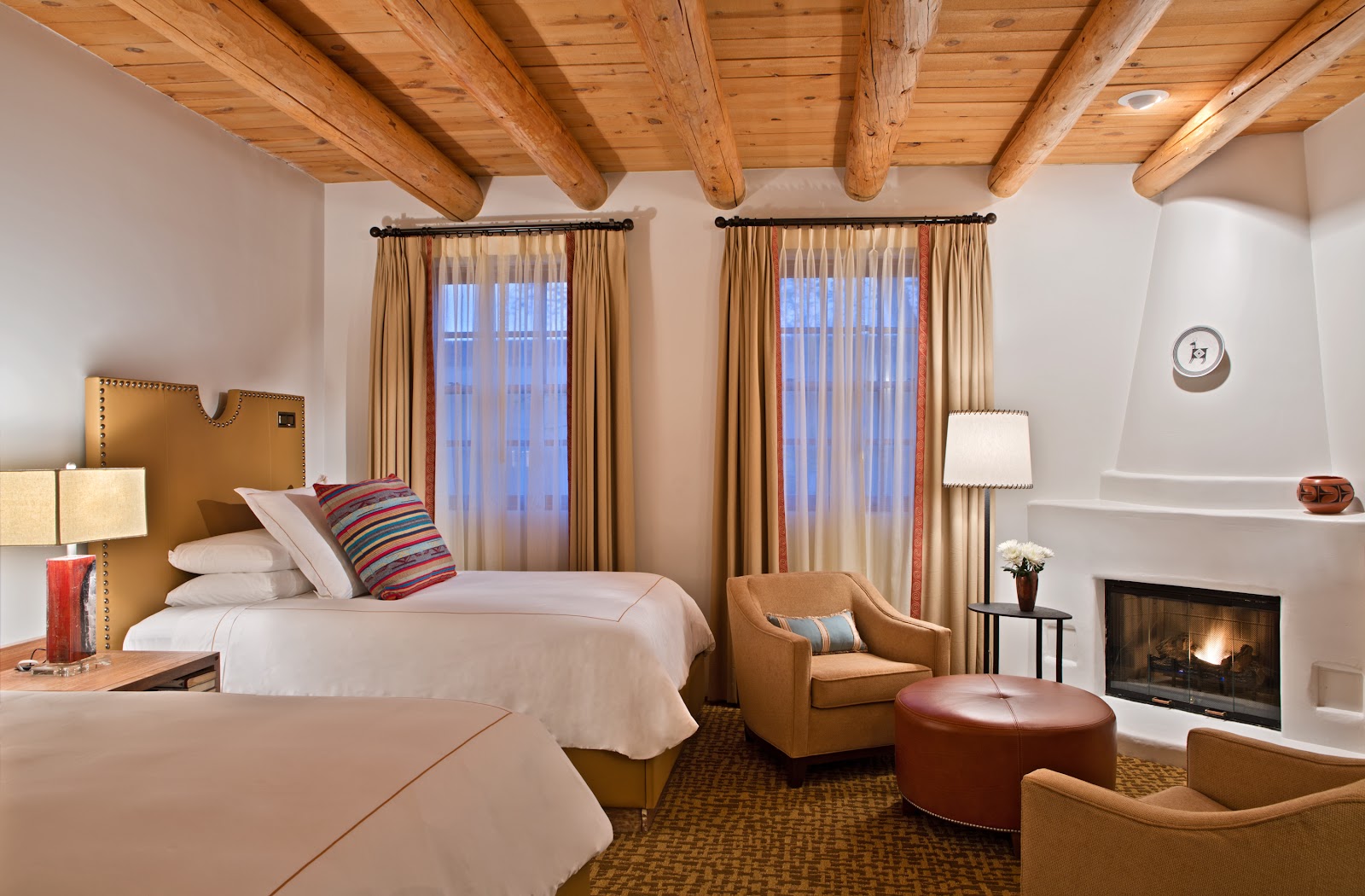 Warm intimate interior room at the Rosewood Inn of the Anasazi, Santa Fe New Mexico