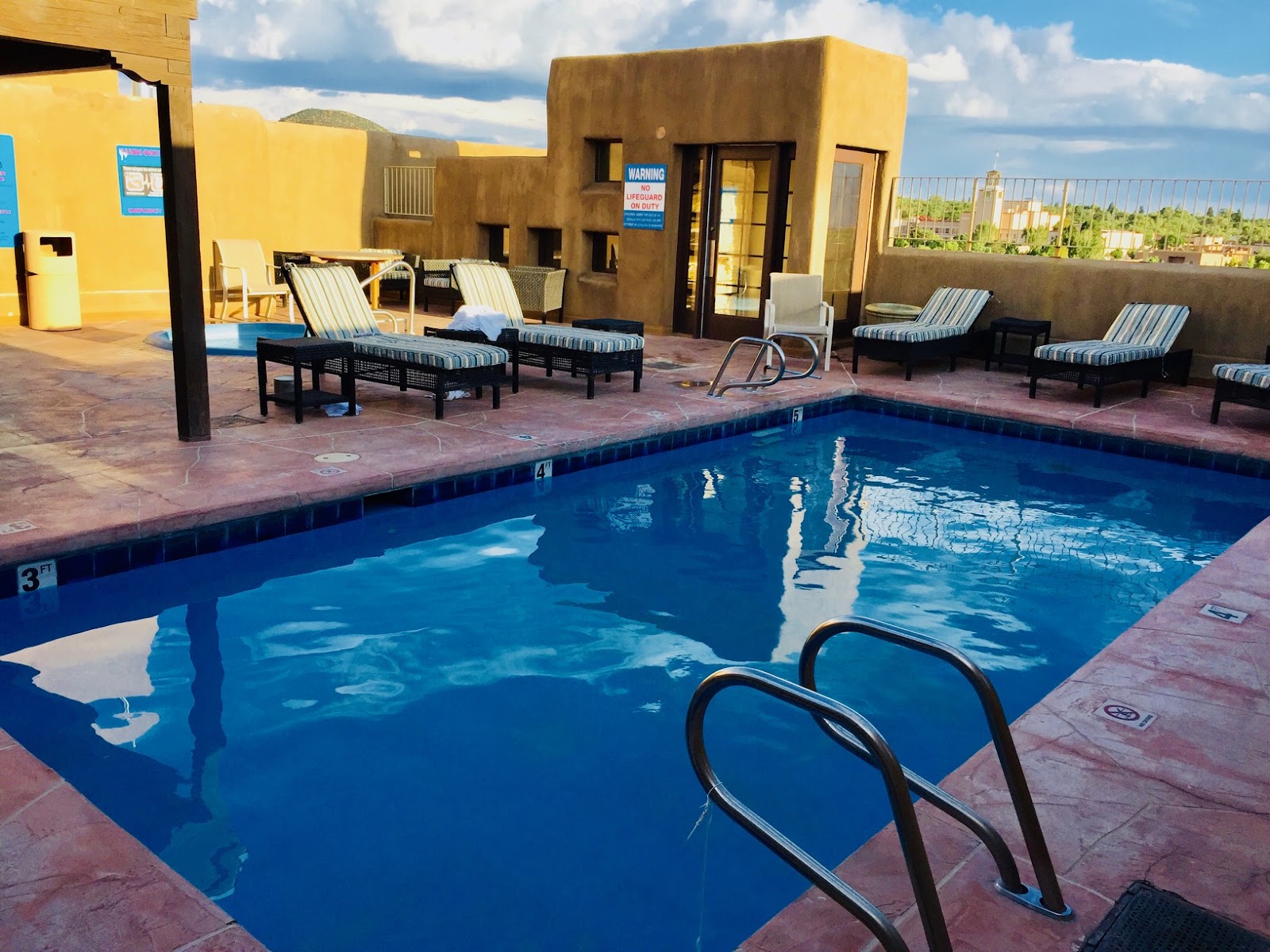 Rooftop terrace at the Eldorado Hotel with views toward the Sangre de Cristo mountains