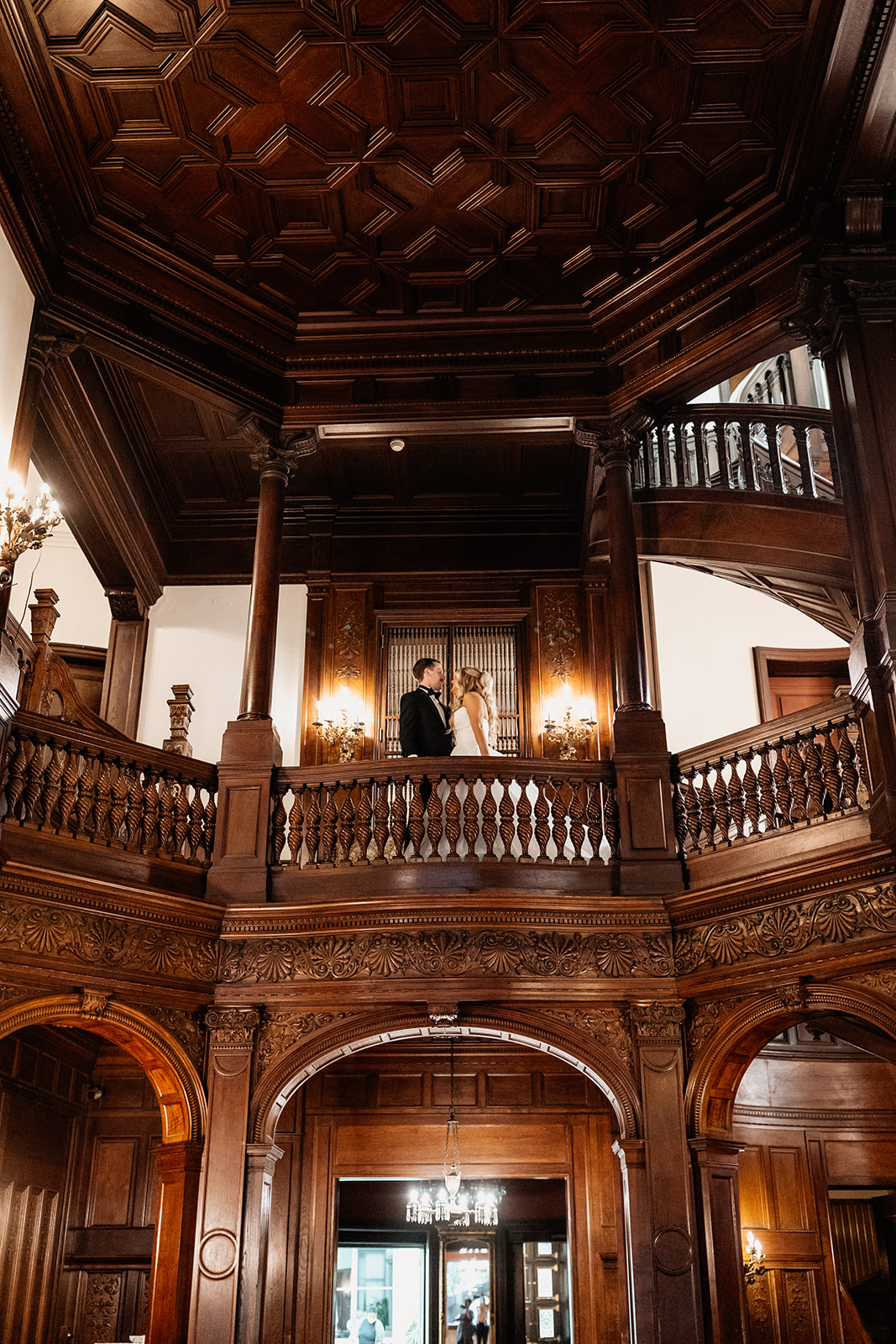 Reception room with tall windows overlooking Mount Vernon Place at the Engineers Club