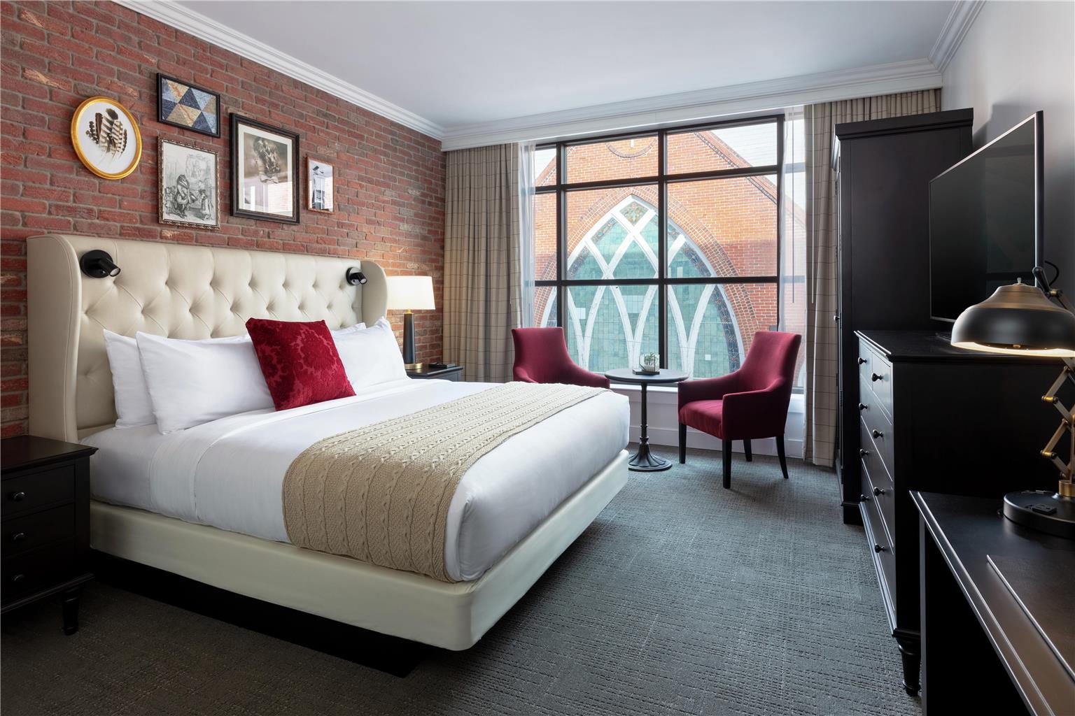 Exposed brick walls and steel structure inside The Foundry Hotel, Asheville