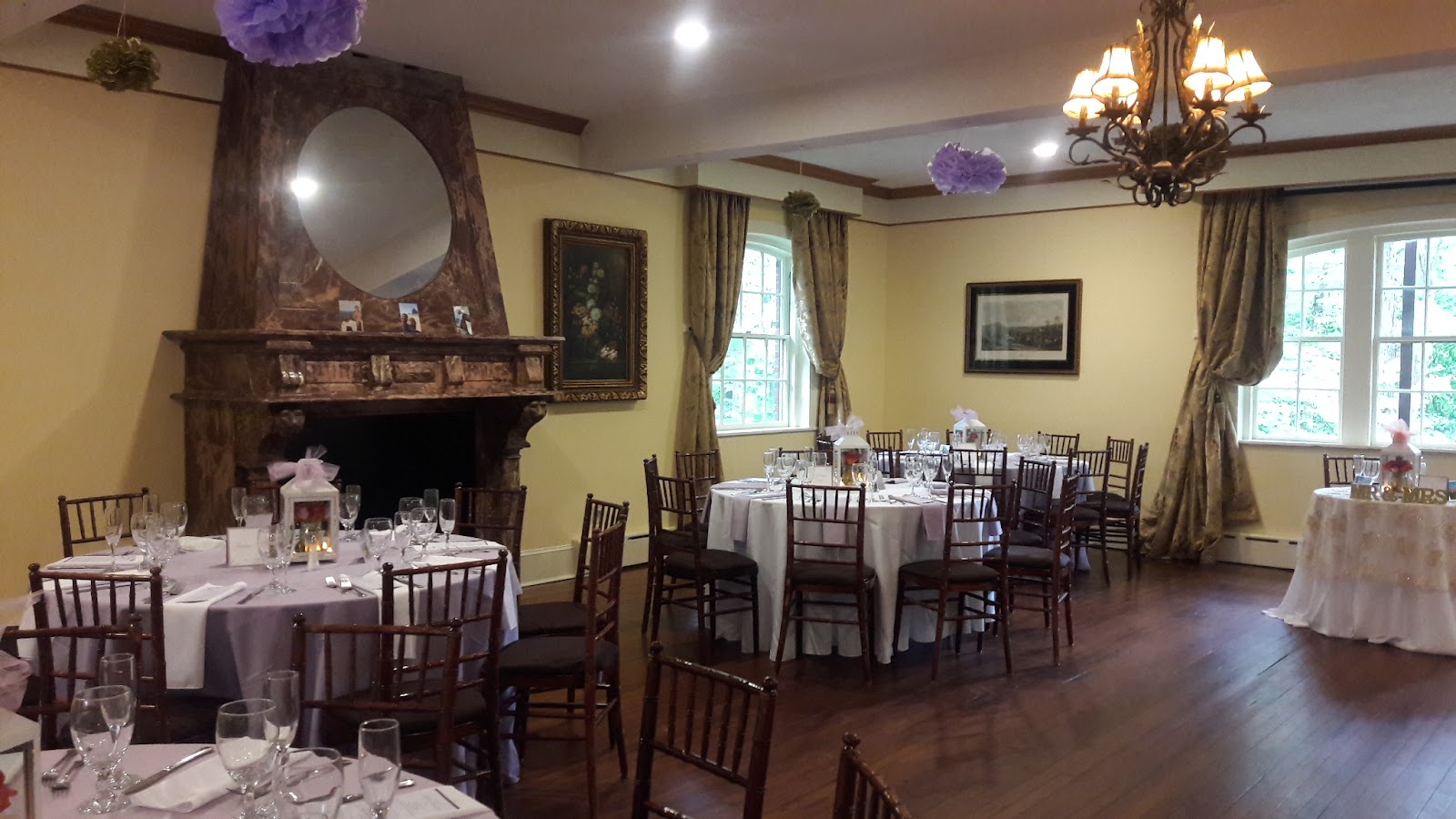 Wet woodland and Tudor architecture at Gramercy Mansion in Maryland rain