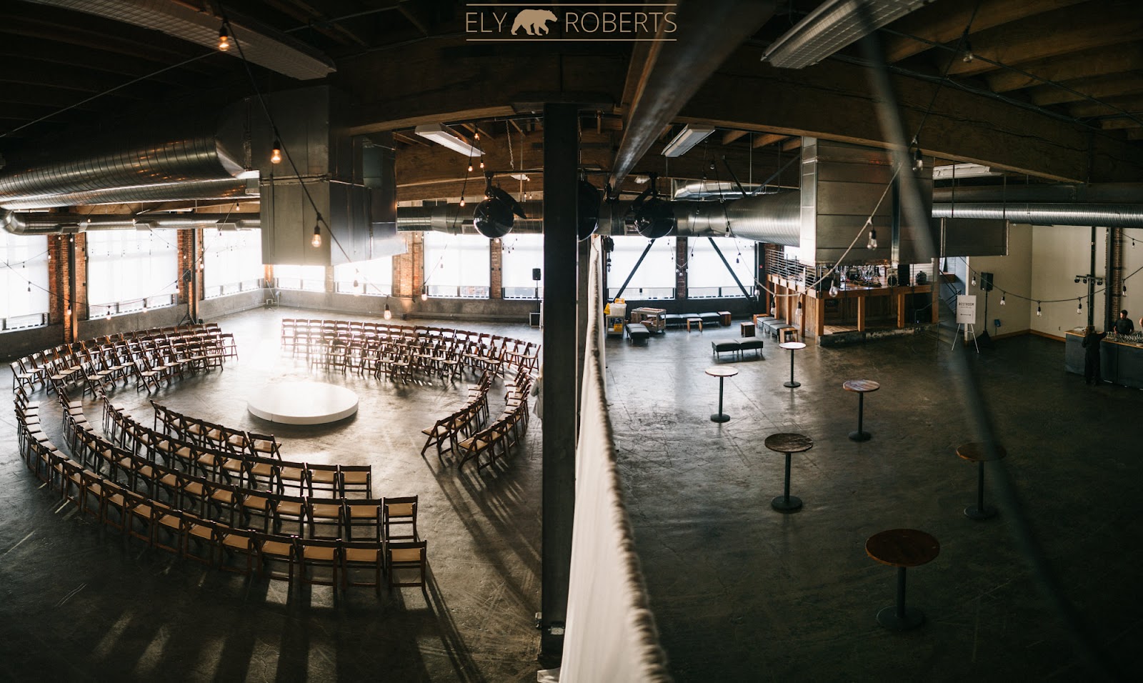 Wedding portrait lit by a large industrial window used as a side light at Leftbank Annex