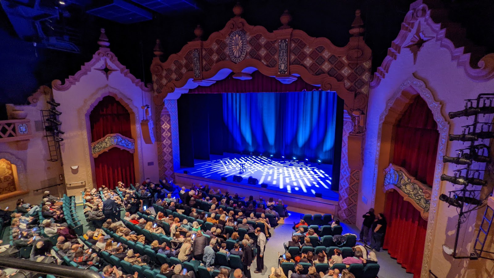 Lit proscenium stage against a dark auditorium at the Lensic theatre, Santa Fe
