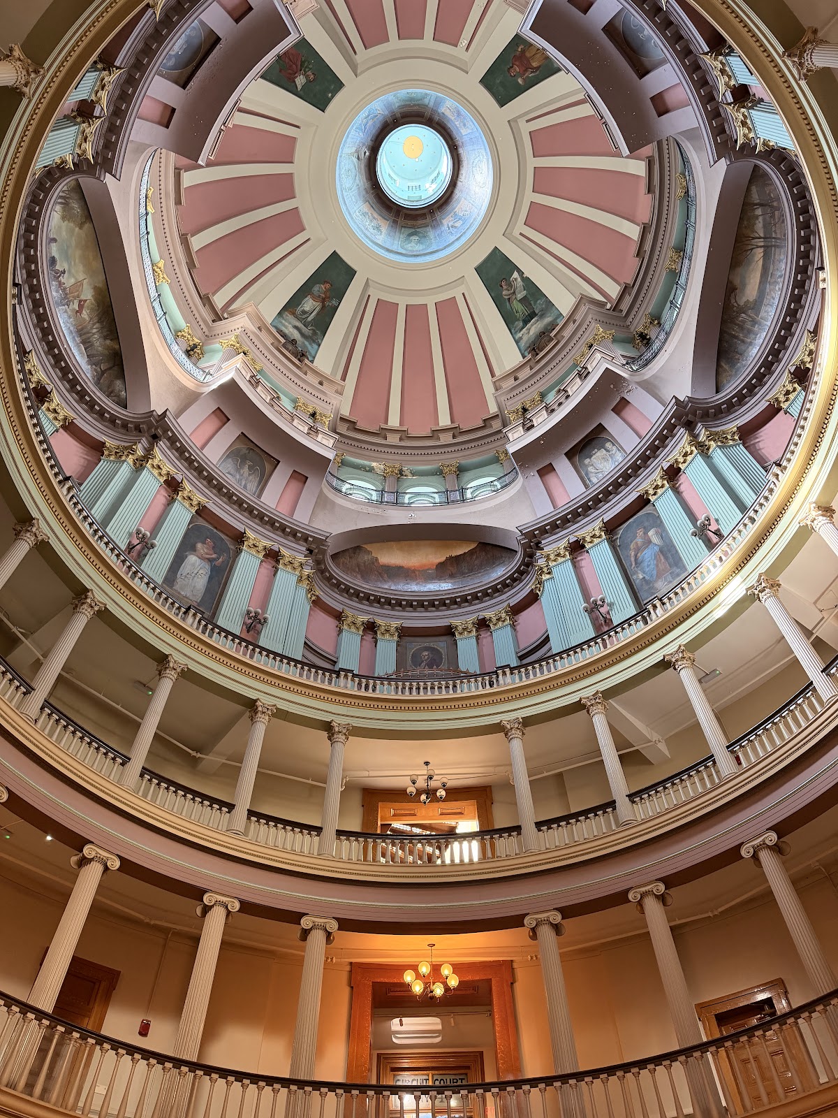 Painted rotunda interior lit from above beneath the cast-iron dome, Old Courthouse St. Louis