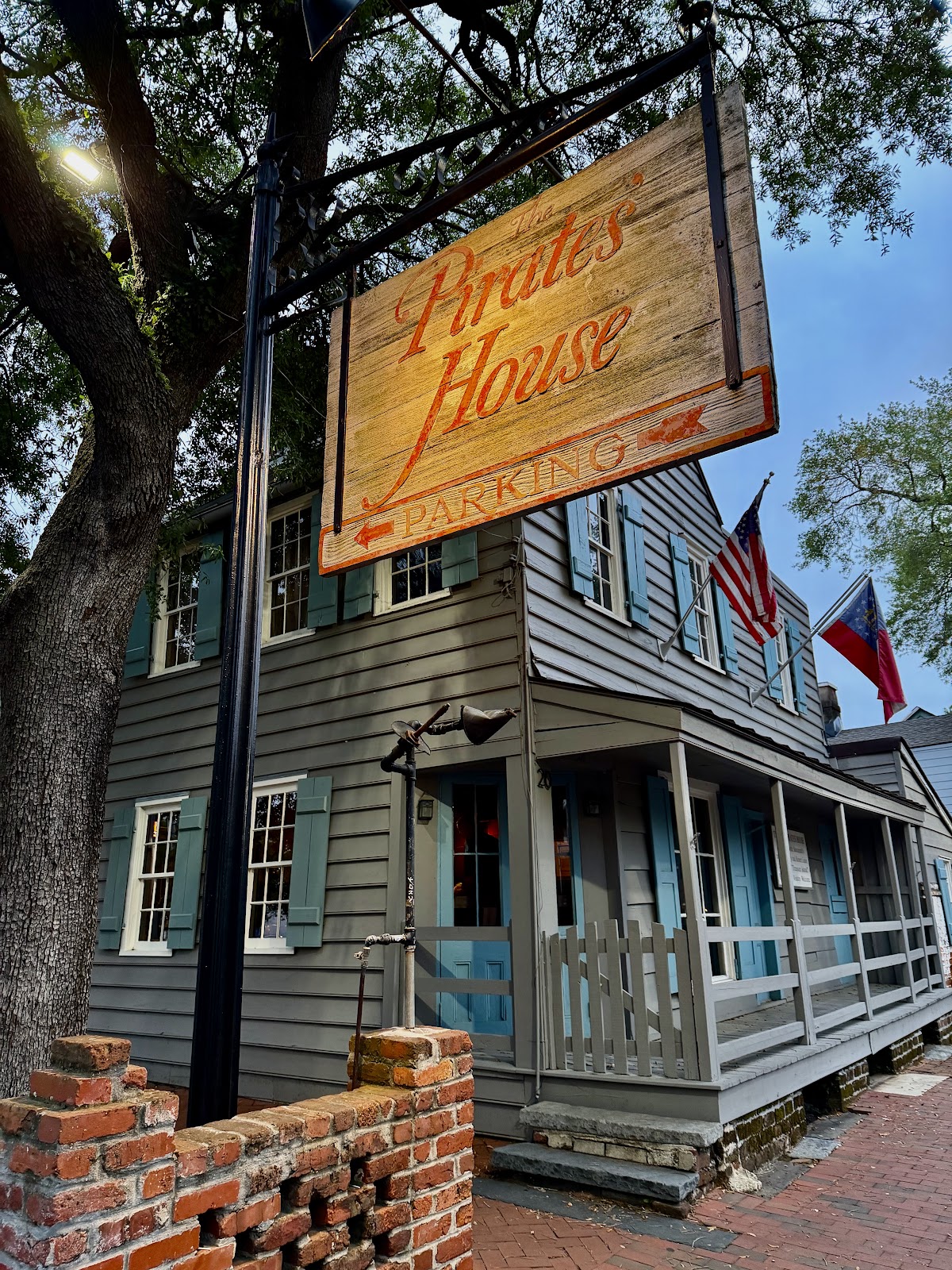 Small low-ceilinged dining room with exposed timber at the Pirates' House, Savannah