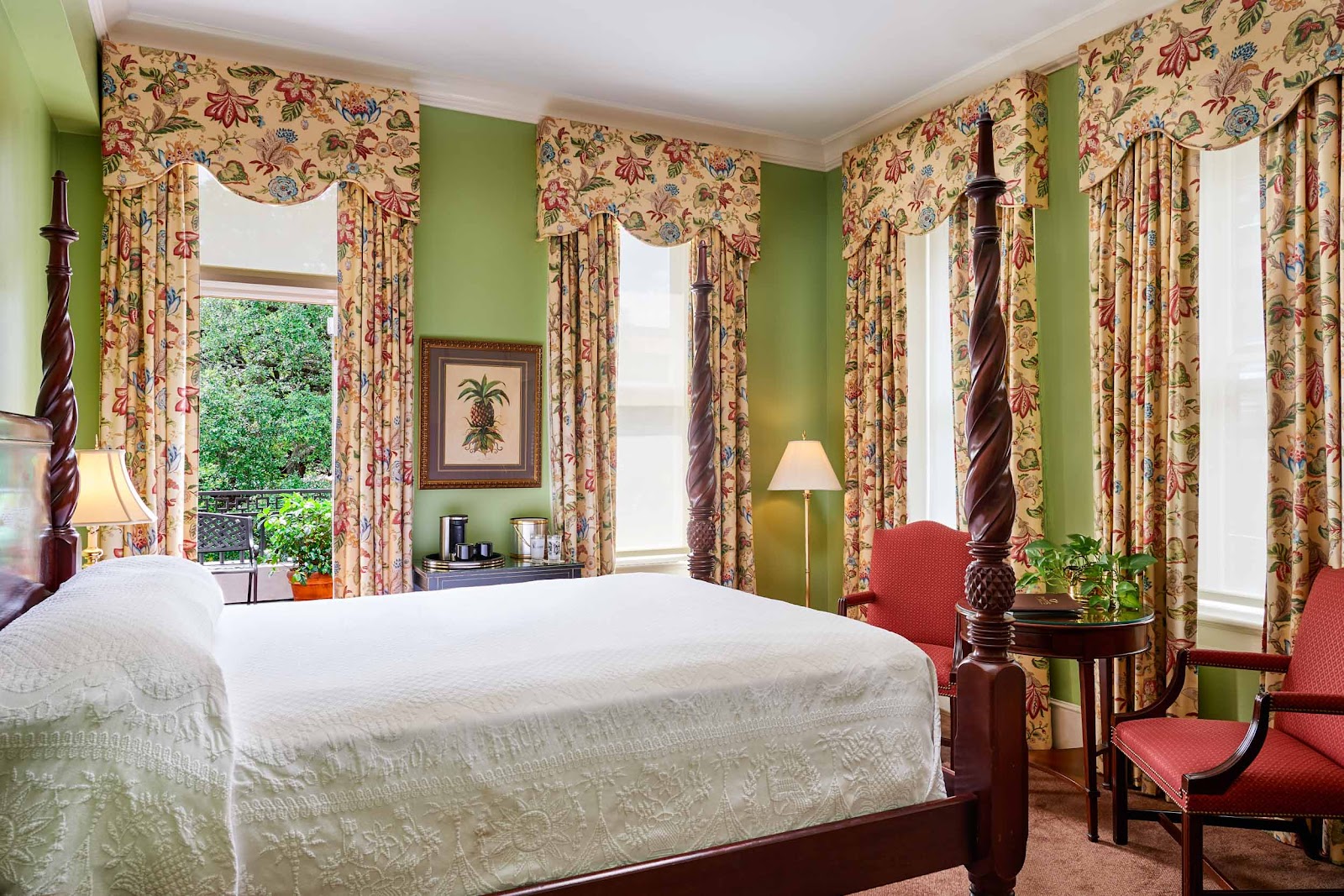 Warm period room with a window at Planters Inn, Savannah Georgia