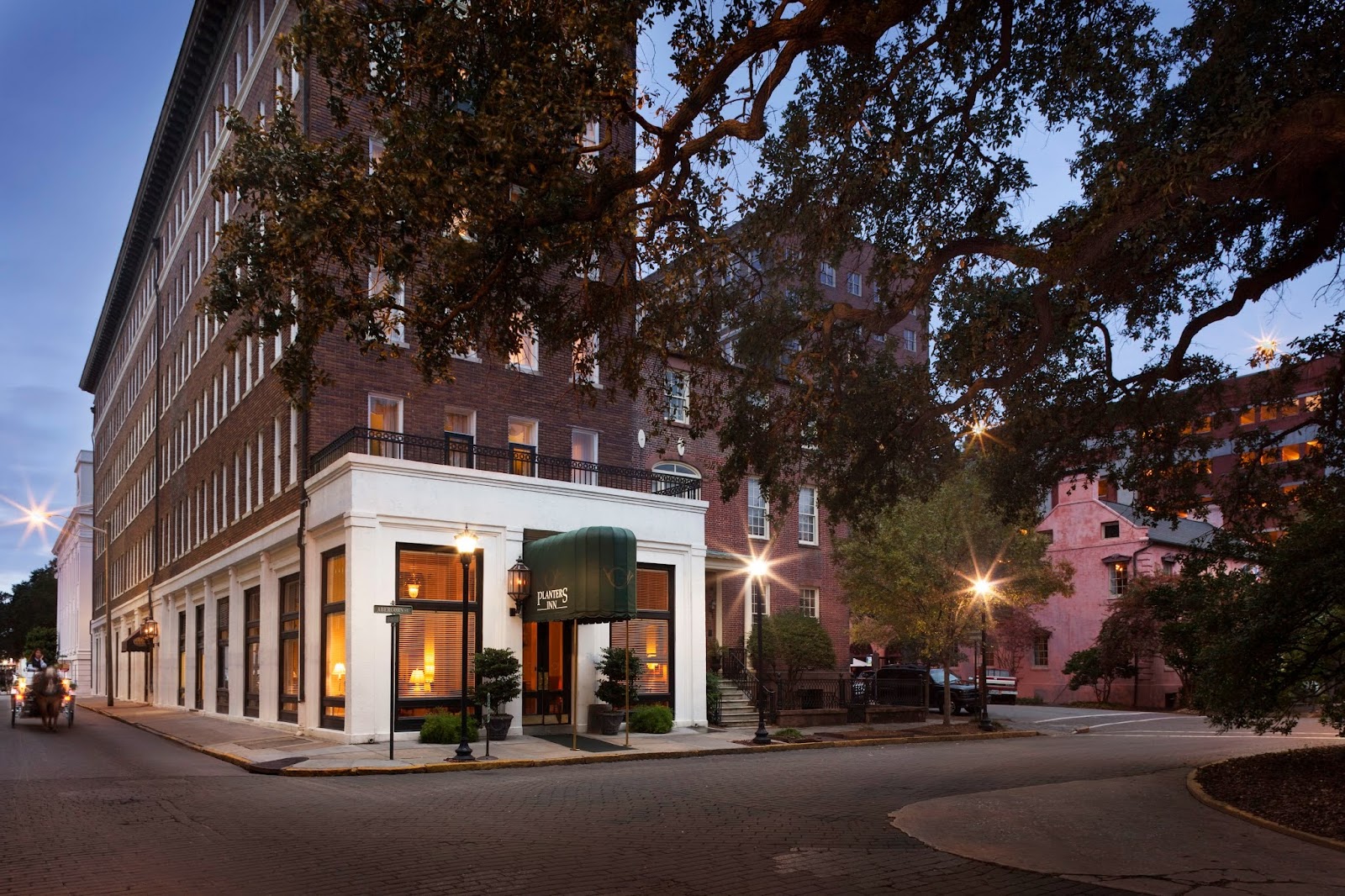 Live oaks and open shade on Reynolds Square outside Planters Inn, Savannah