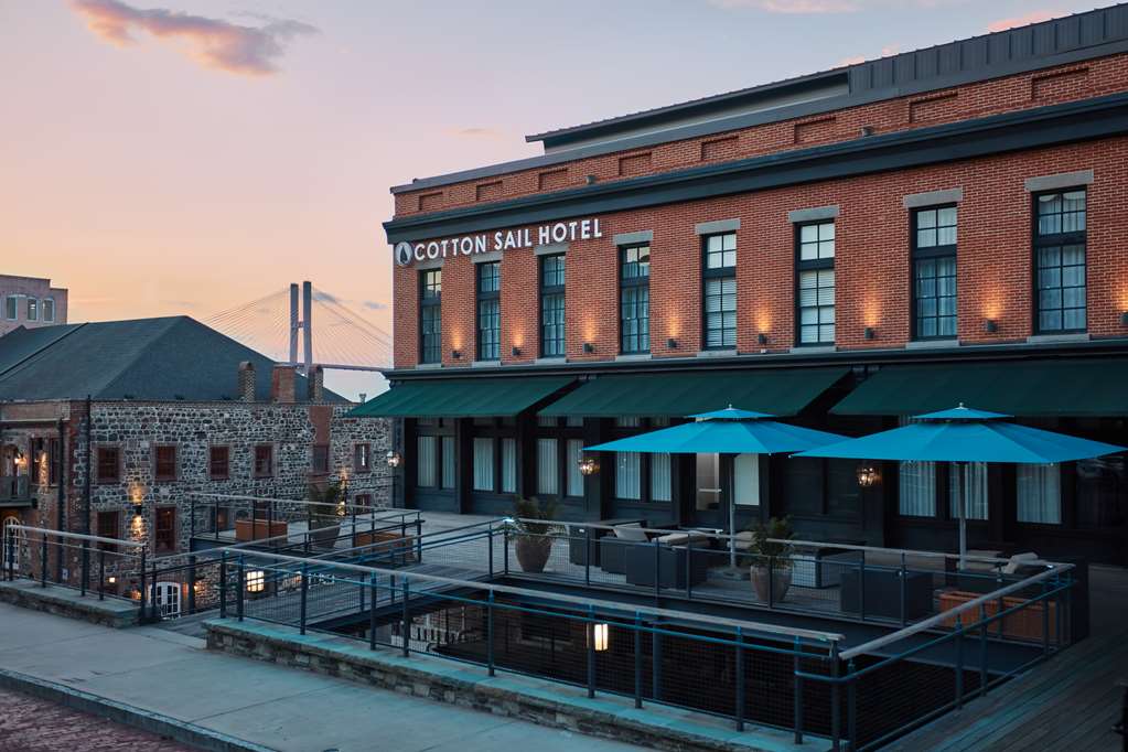 Row of converted cotton warehouses on River Street, Savannah, in raking late light