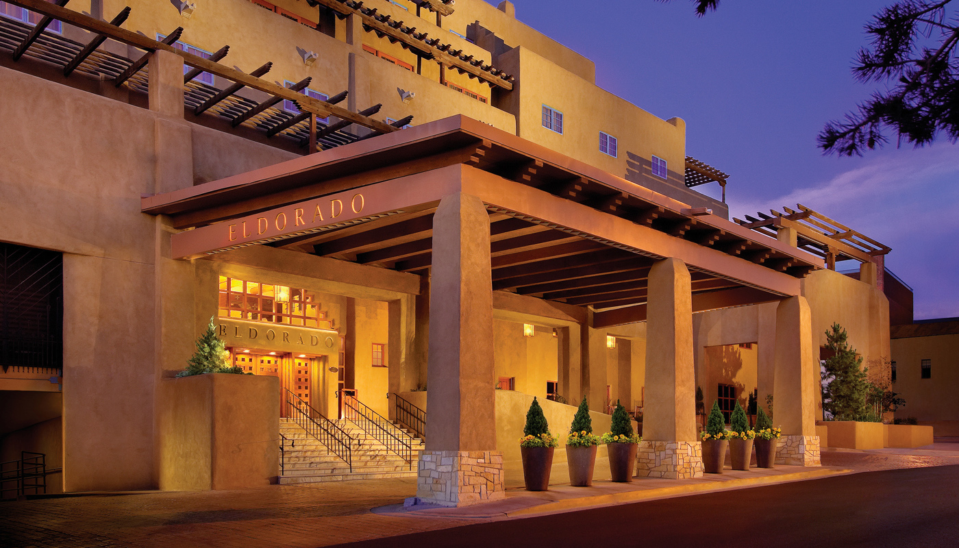 Adobe portals and carved doors near the Santa Fe Plaza in raking late light
