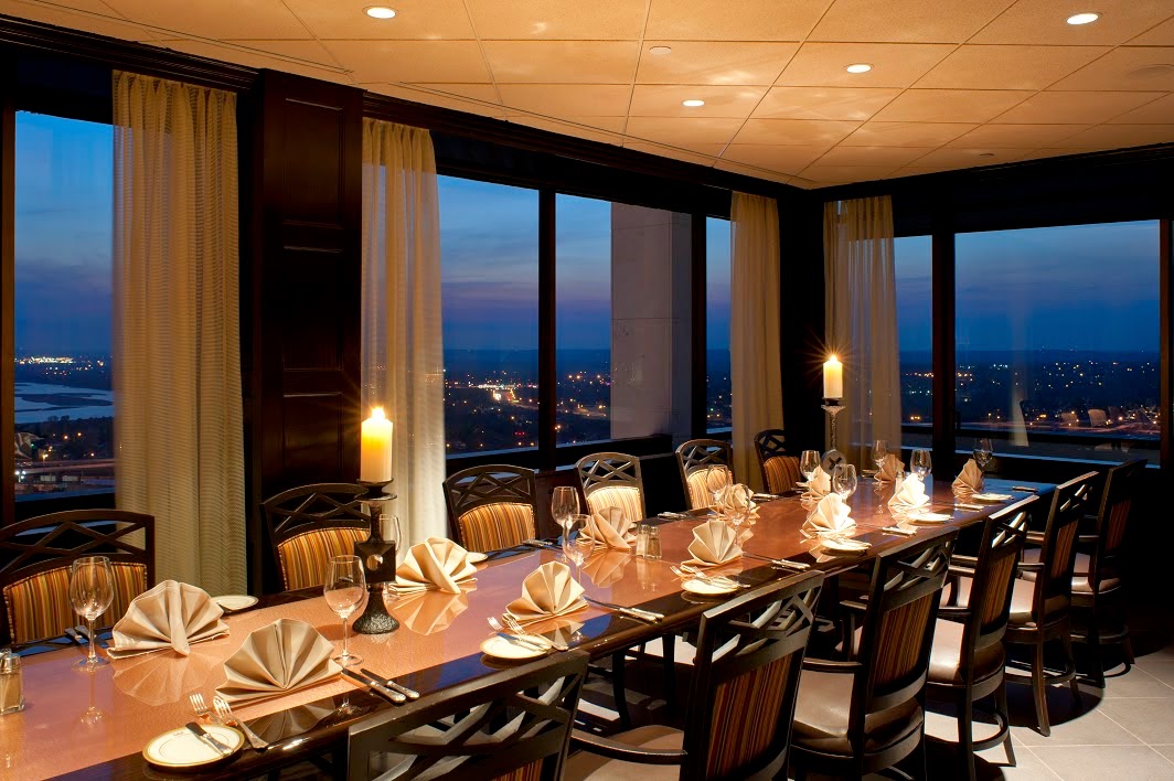 Night reflections in floor-to-ceiling glass at The Summit Club, Tulsa Oklahoma