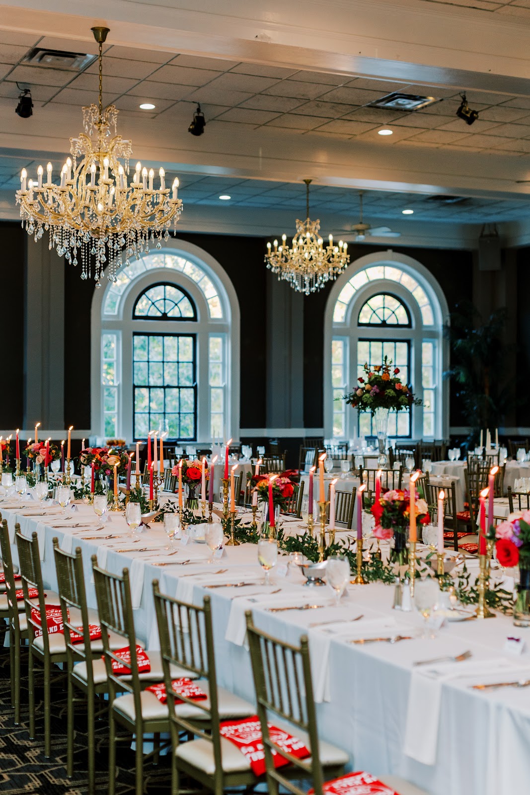 The Olmsted hall after dark with windows gone dark during a wedding reception