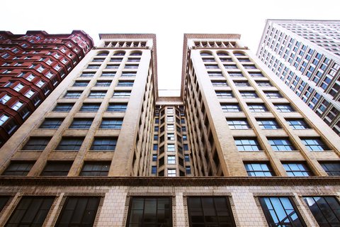 Late nineteenth-century terracotta and stone architecture in downtown St. Louis at dusk