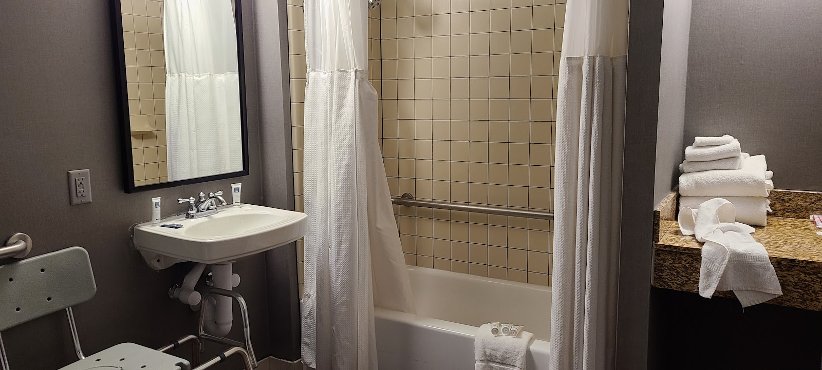 Brass and metallic Art Deco finishes catching specular highlights at the Lord Baltimore Hotel
