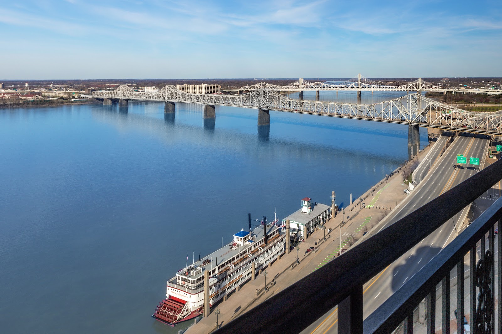 Louisville waterfront and Ohio River bridges at dusk near the Galt House Hotel