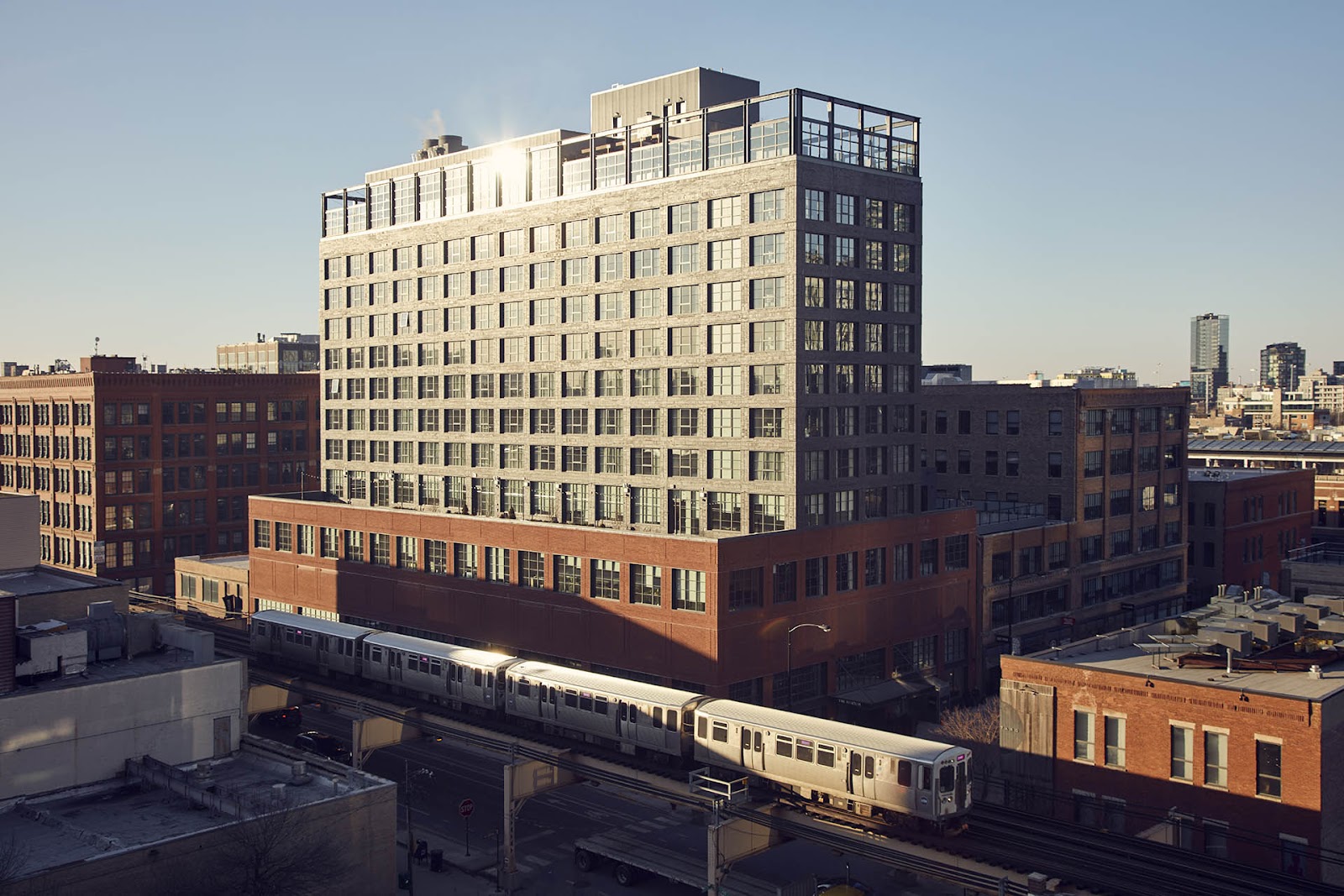 Large warehouse windows and brick walls in a converted Chicago building