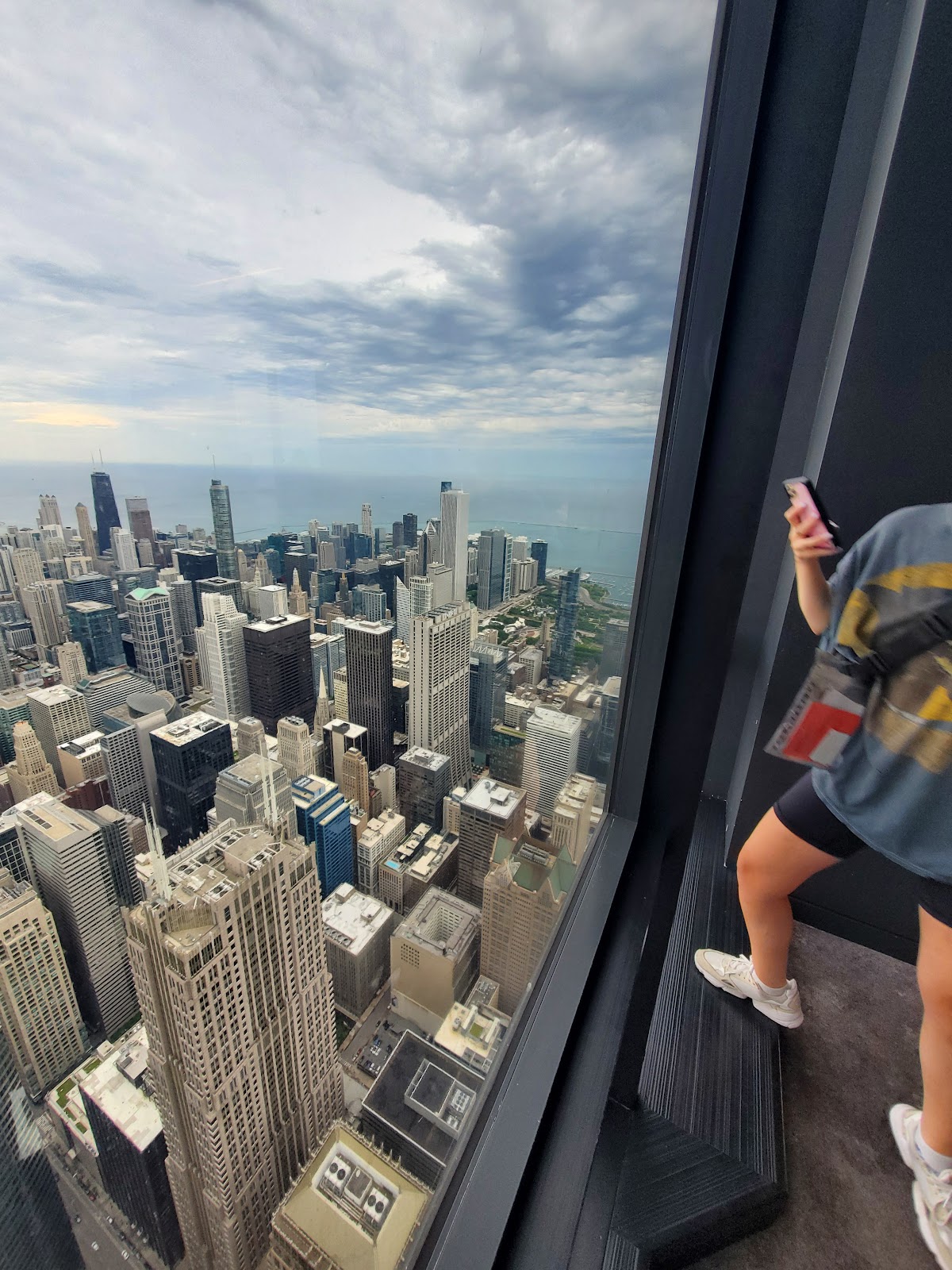 Looking straight down through a glass floor from a high observation box